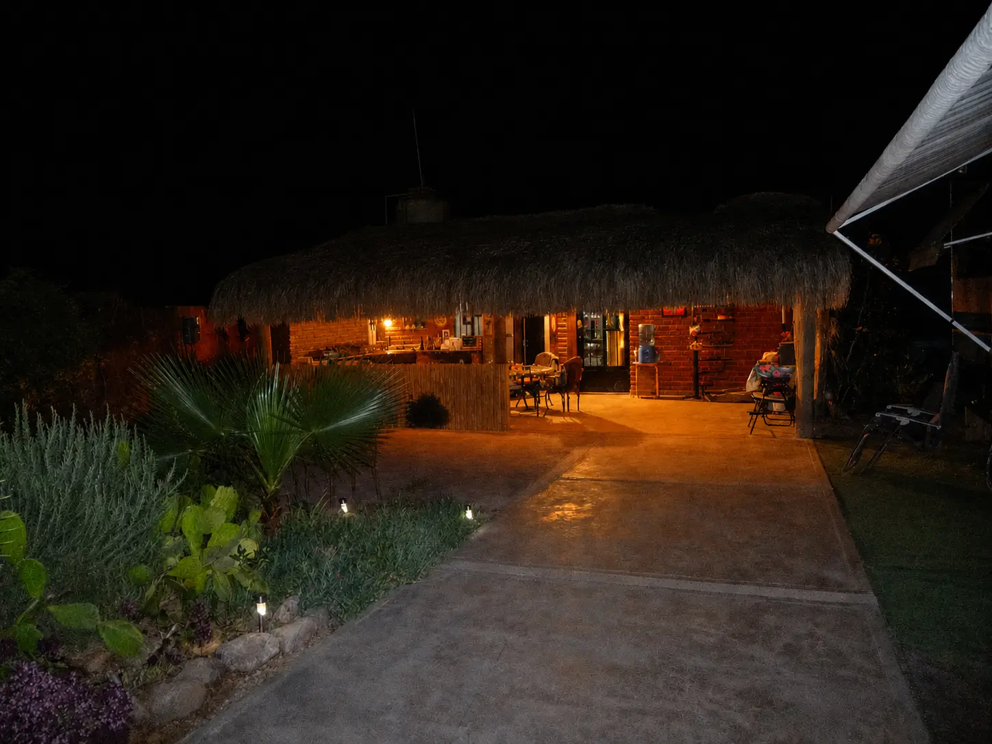 Courtyard warmly lit after dark