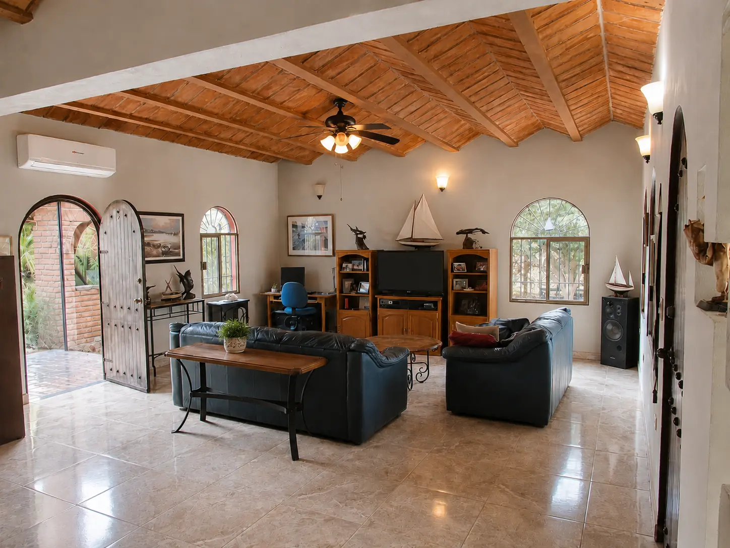 Open-plan living room in the main house